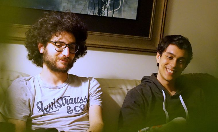 Herman and Franco, the two founders of Rivus, working on a couch
